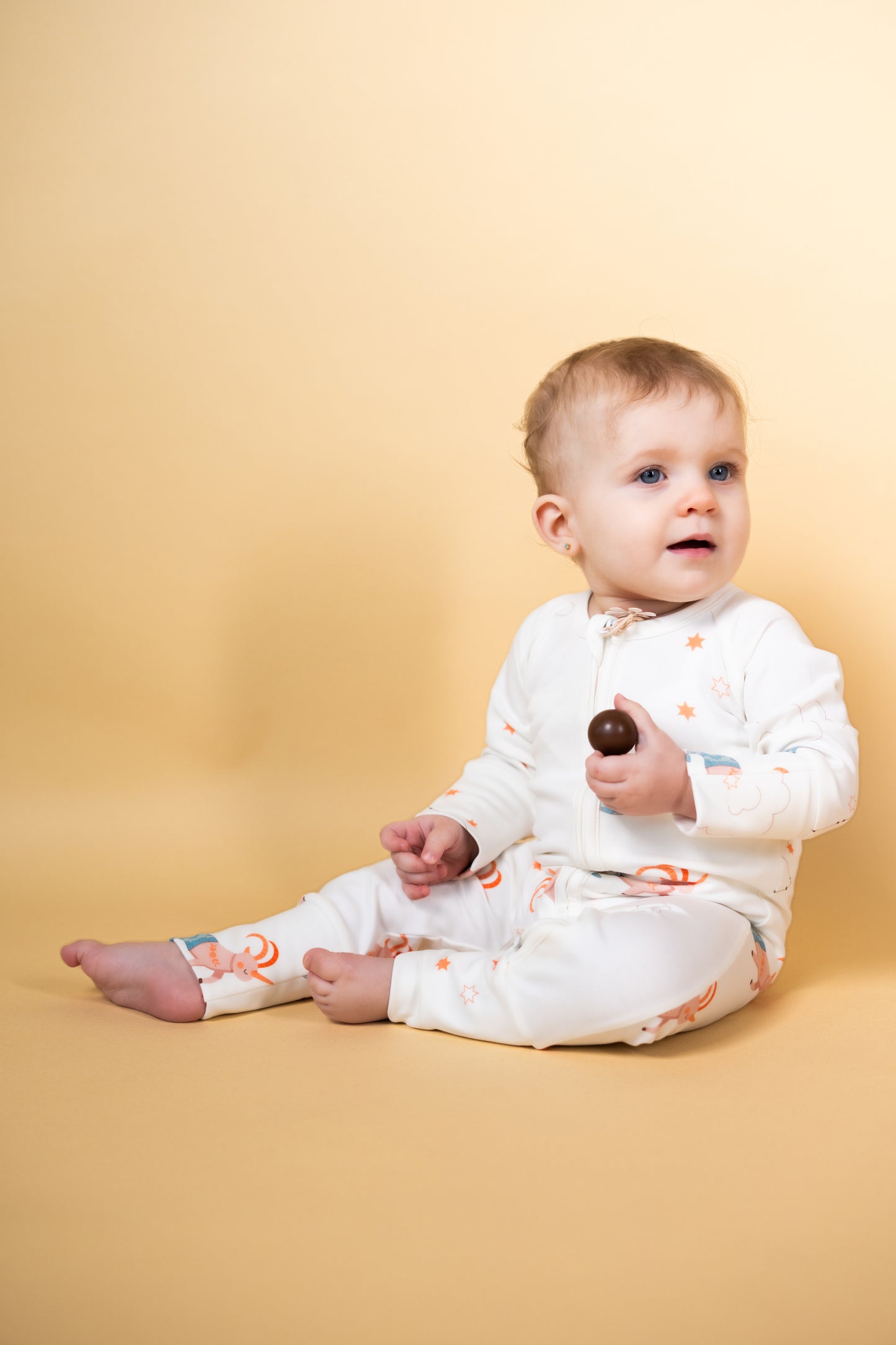 Capricorn Zodiac All-Over Onesie